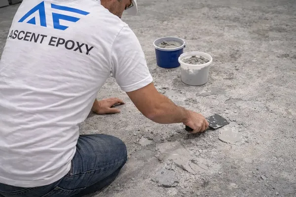 Grinding and preparing concrete after coating removal in Orlando