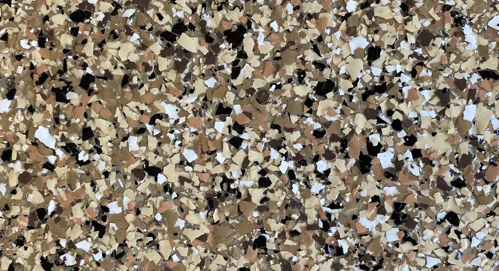 Tan and black flake epoxy floor close-up