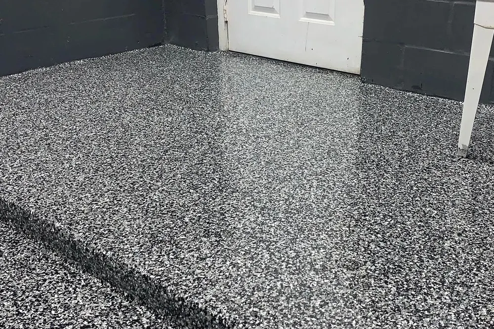 Utility room black and white flake epoxy floor