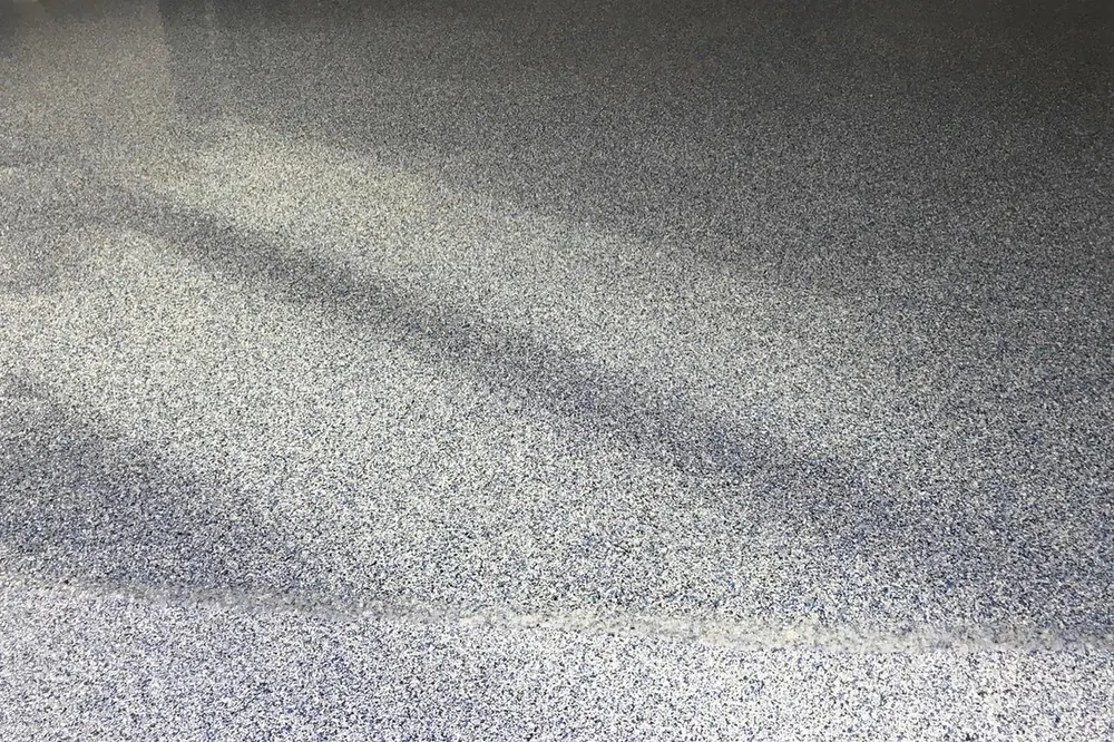 Blue-gray flake epoxy garage floor real Orlando project