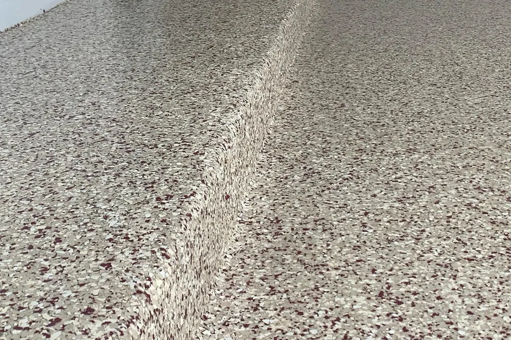 Tan flake coated garage step